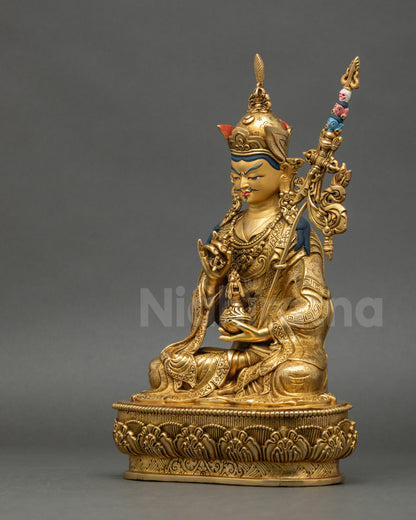 Left-side view holding skull cup, gold-gilded copper, handcrafted in Nepal