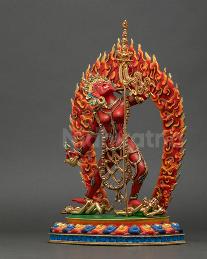 Left-side view of Vajrayogini Statue displaying khatvanga trident and dynamic posture