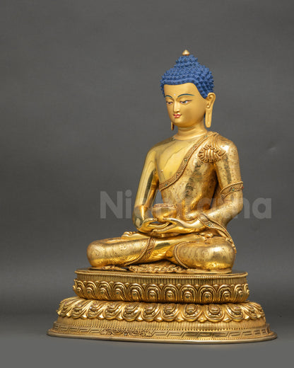 Left-side view of handcrafted Amitabha Buddha showing gold-gilded copper and Dhyana Mudra
