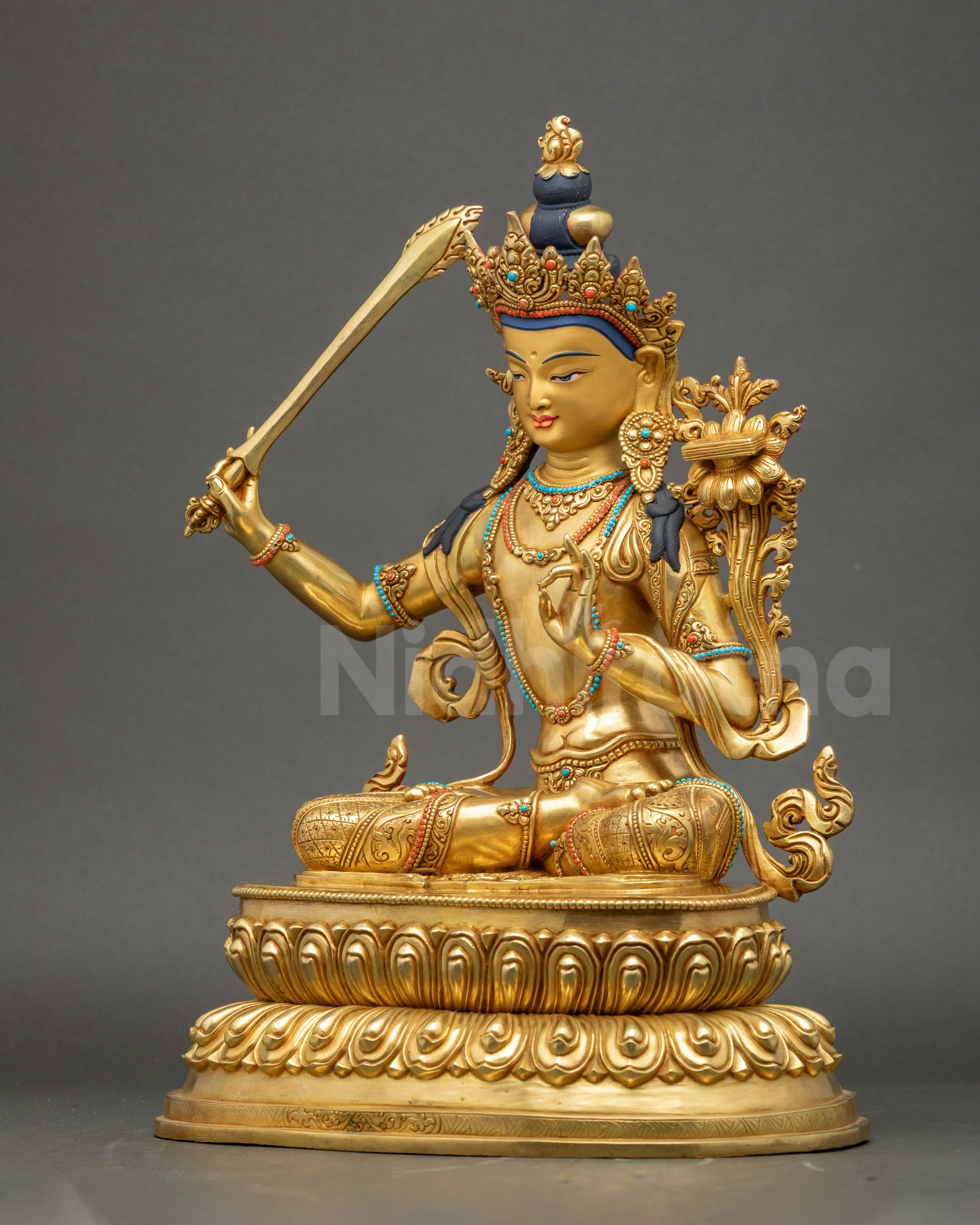 Left Side of Manjushri Statue Highlighting Gilded Copper Details