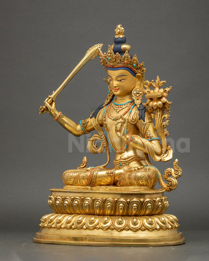 Left Side of Manjushri Statue Highlighting Gilded Copper Details