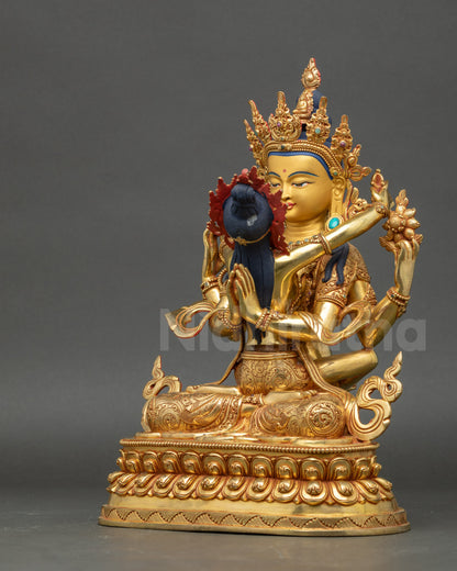 Left angle showing carved lower garments and lotus base