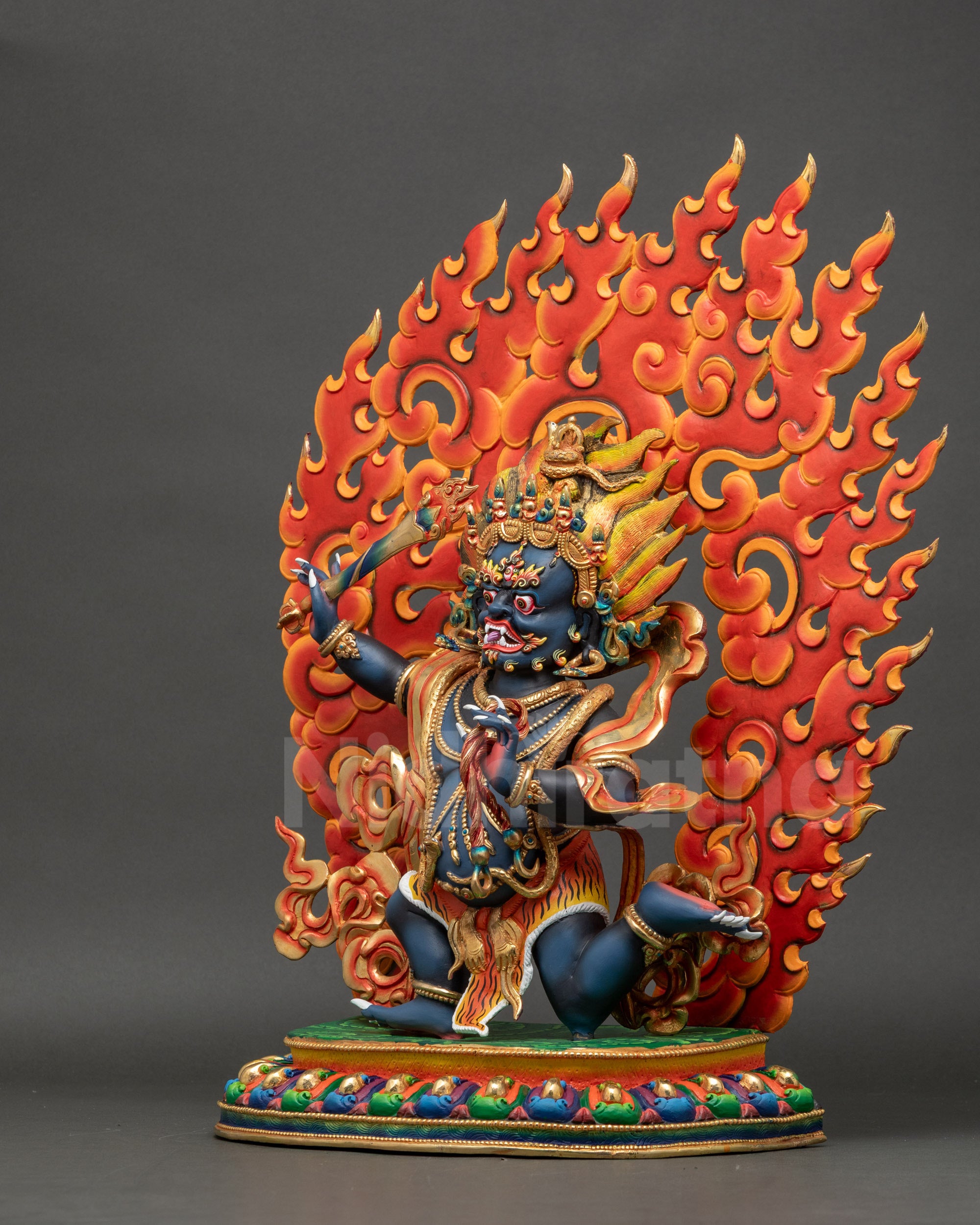 Left profile of Achala Statue highlighting serpent and garment details