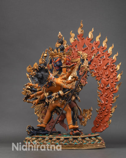 Left profile of Kalachakra copper statue, detailed gold-gilded finish and halo