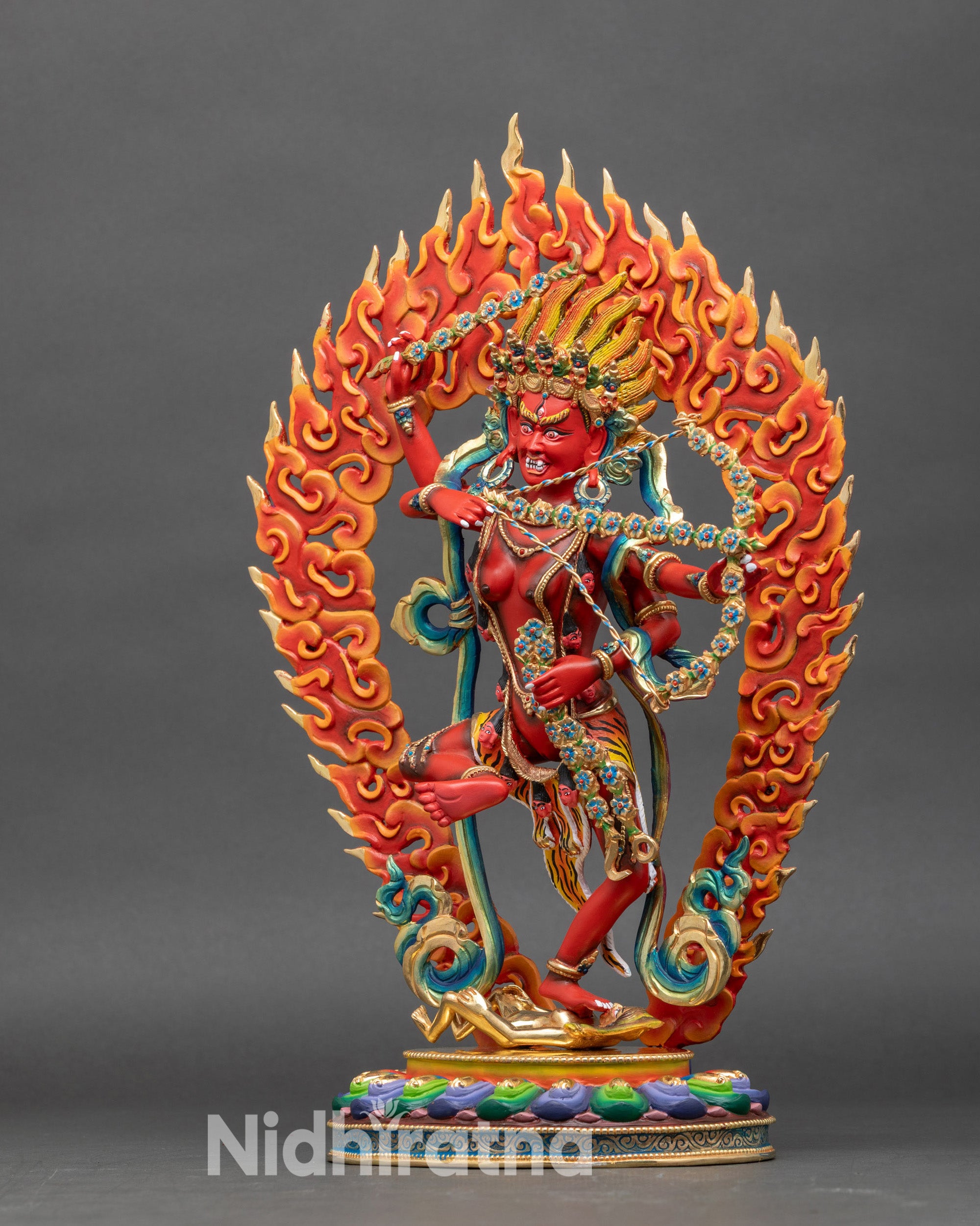 Left profile of Kurukulla Statue, copper detailing and semi-precious inlays