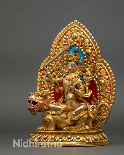 Left profile of Manjushri statue, Snow Lion seat and gold fire-gilding details