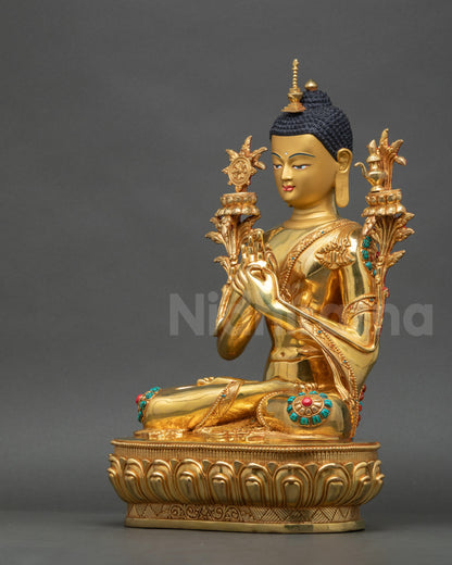 Left profile of gold-gilded Maitreya Buddha figurine showing intricate robe patterns