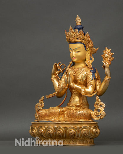 Left side of Chenrezig statue showing detailed robe patterns and sacred objects