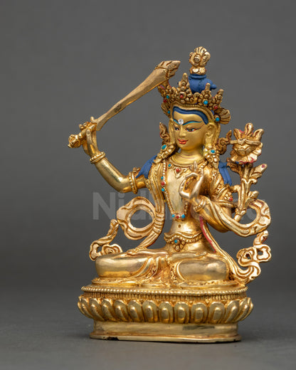 Left side of Manjushri Statue with lotus posture and Abhay mudra holding flower