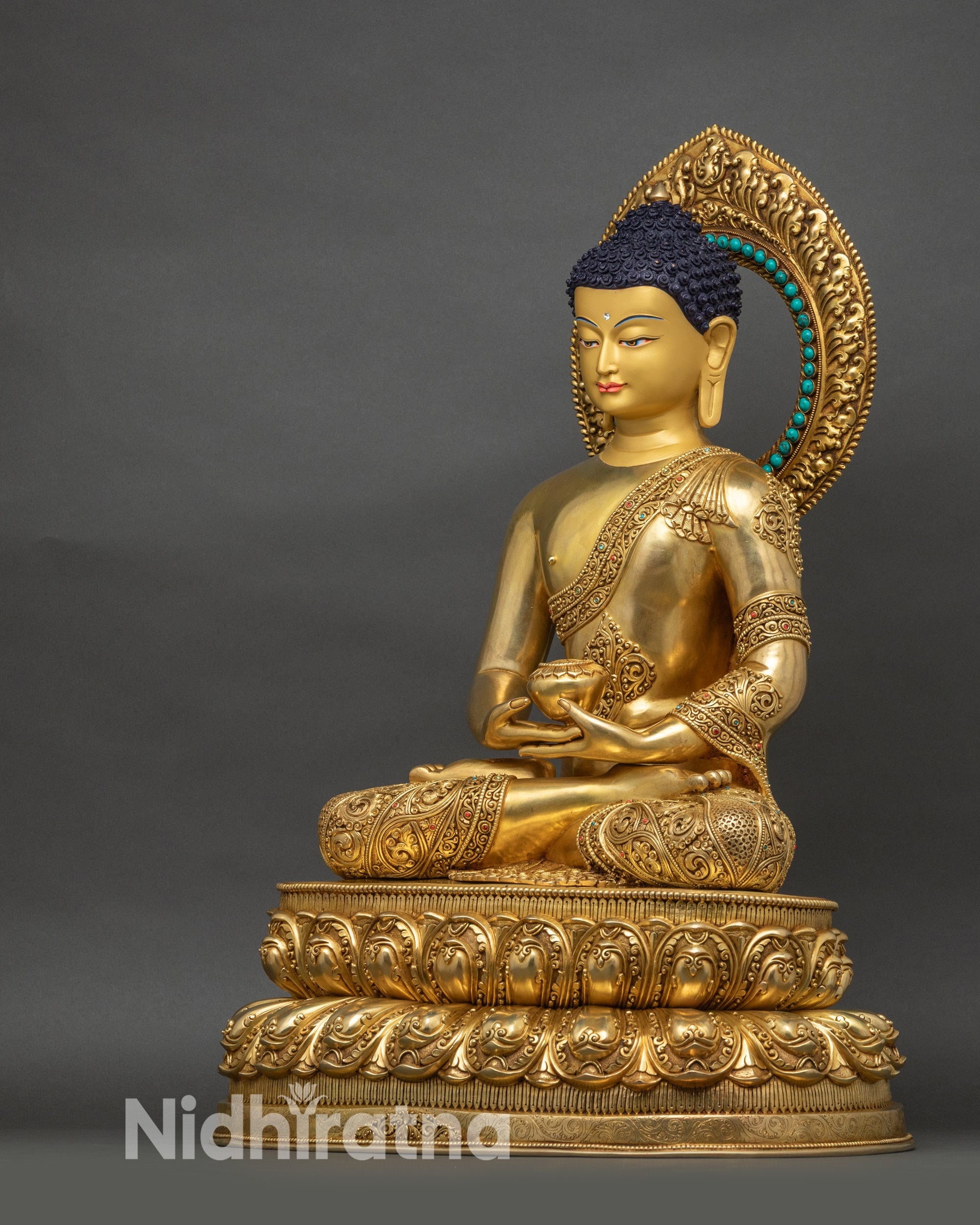 Left side view Amitabha Buddha statue with intricate robe patterns