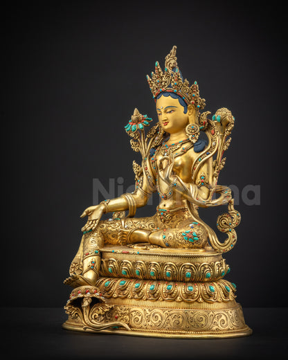 Left side view Green Tara Statue showing floral carvings and semi-precious stones