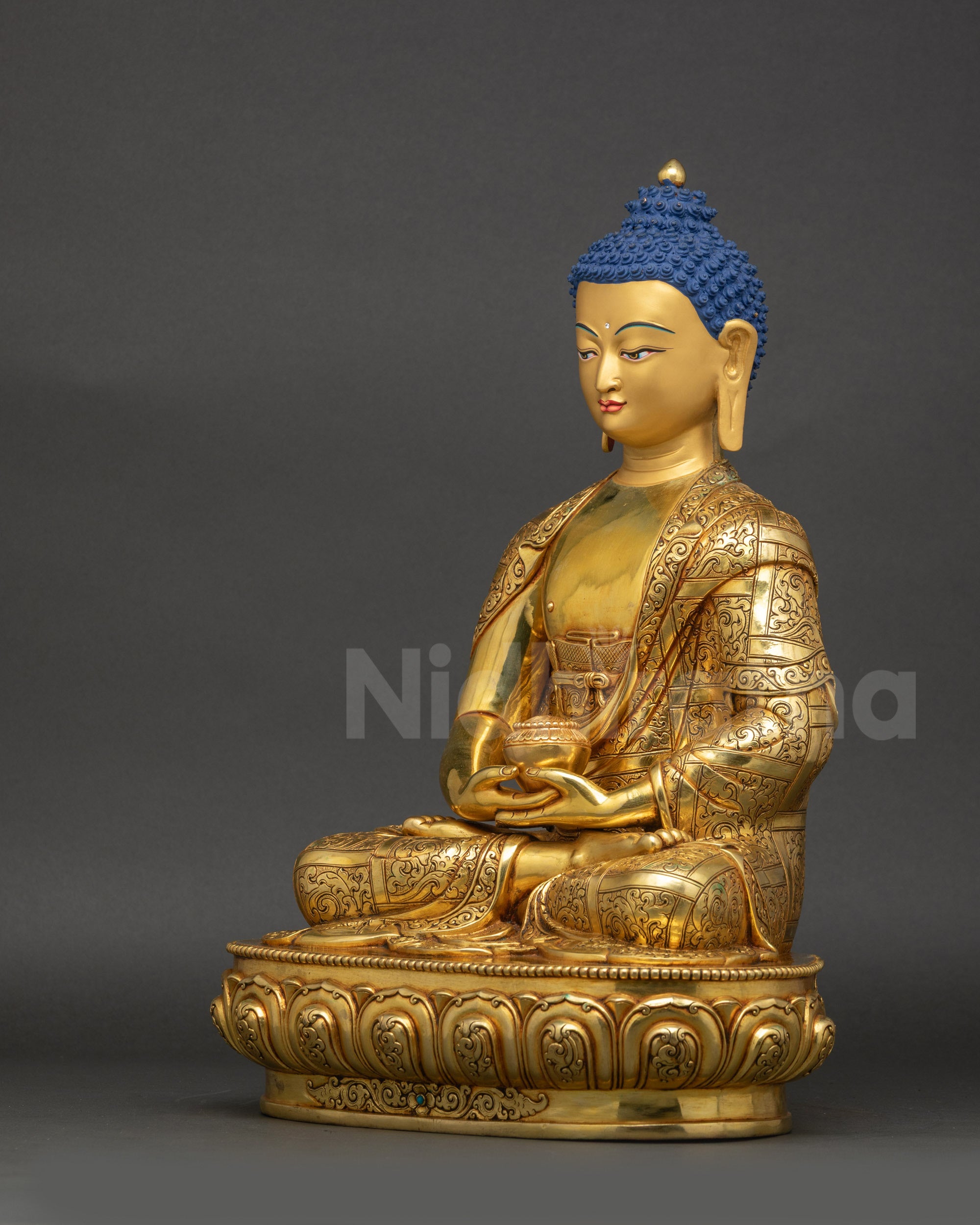 Left side view Himalayan Amitabha Buddha sculpture with detailed robe carvings and balanced posture
