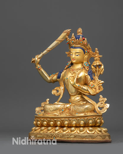 Left side view Manjushri sculpture showing utpala flower, sword, and detailed robe patterns