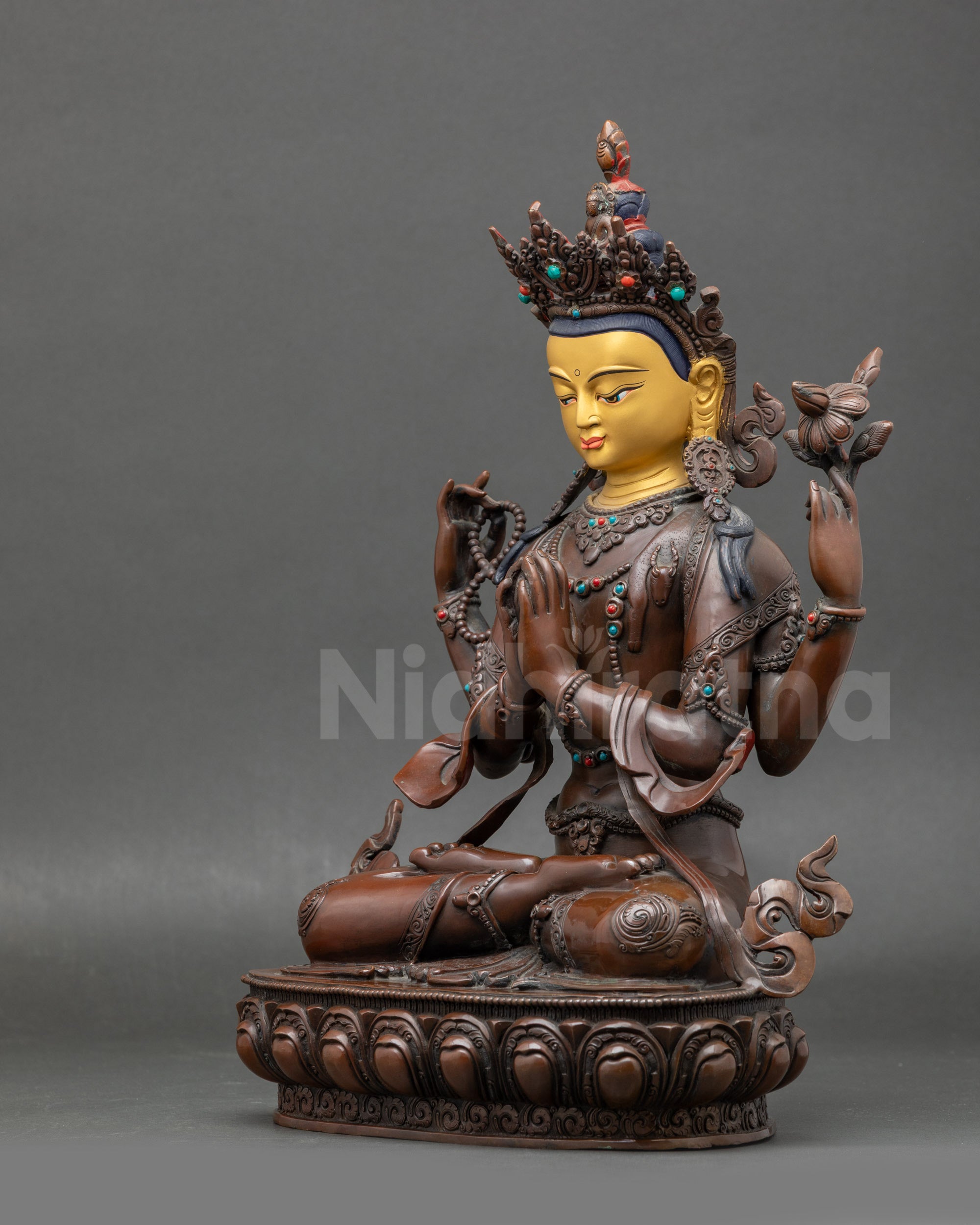 Left side view – Nepalese Chenrezig figure with crown, jewelry, and spiritual ornaments