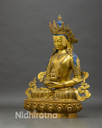 left-side-view-of-amitayus-statue-with-flowing-robes-gemstone-inlays-and-lotus-pedestal-details