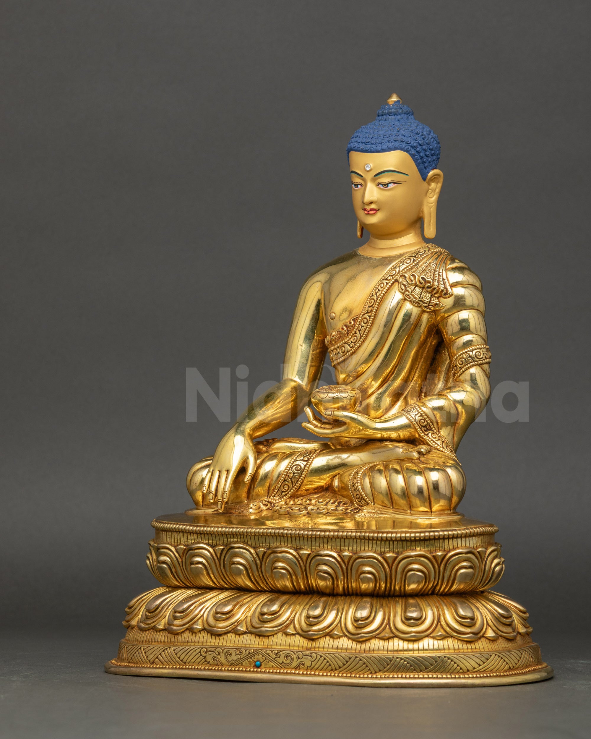 Left side view of Buddha Shakyamuni Statue gold fire-gilded base and robes