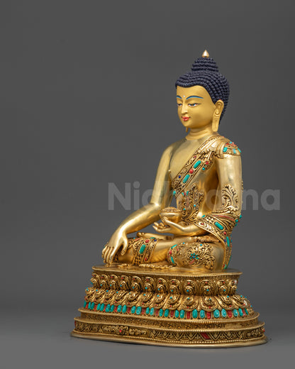 Left side view of Buddha Shakyamuni statue with protective Garuda head and stone embellishments