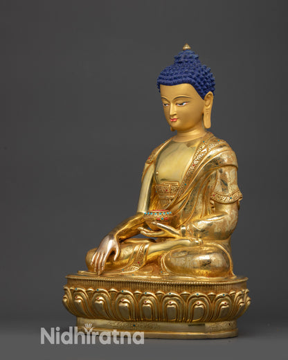 Left side view of Buddha statue with lotus posture and earth-touching mudra
