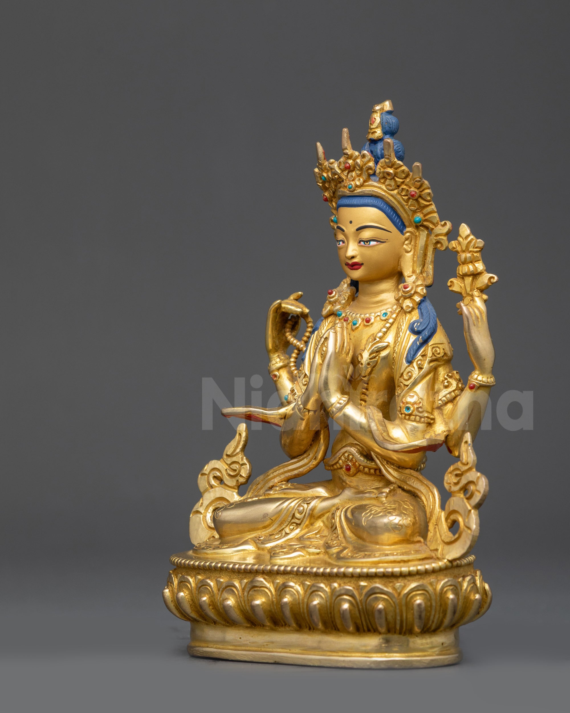 Left side view of Chenrezig Statue showing detailed lower garments and jewelry