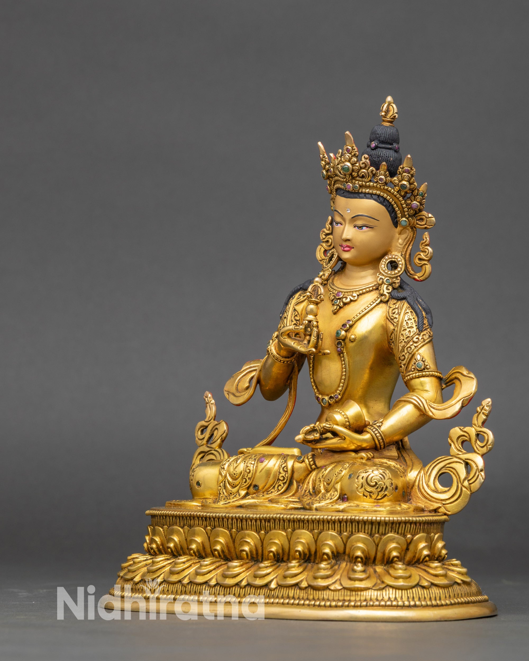 Left side view of Dorje Sempa Vajrasattva statue, gold fire-gilded Nepalese spiritual purification figure