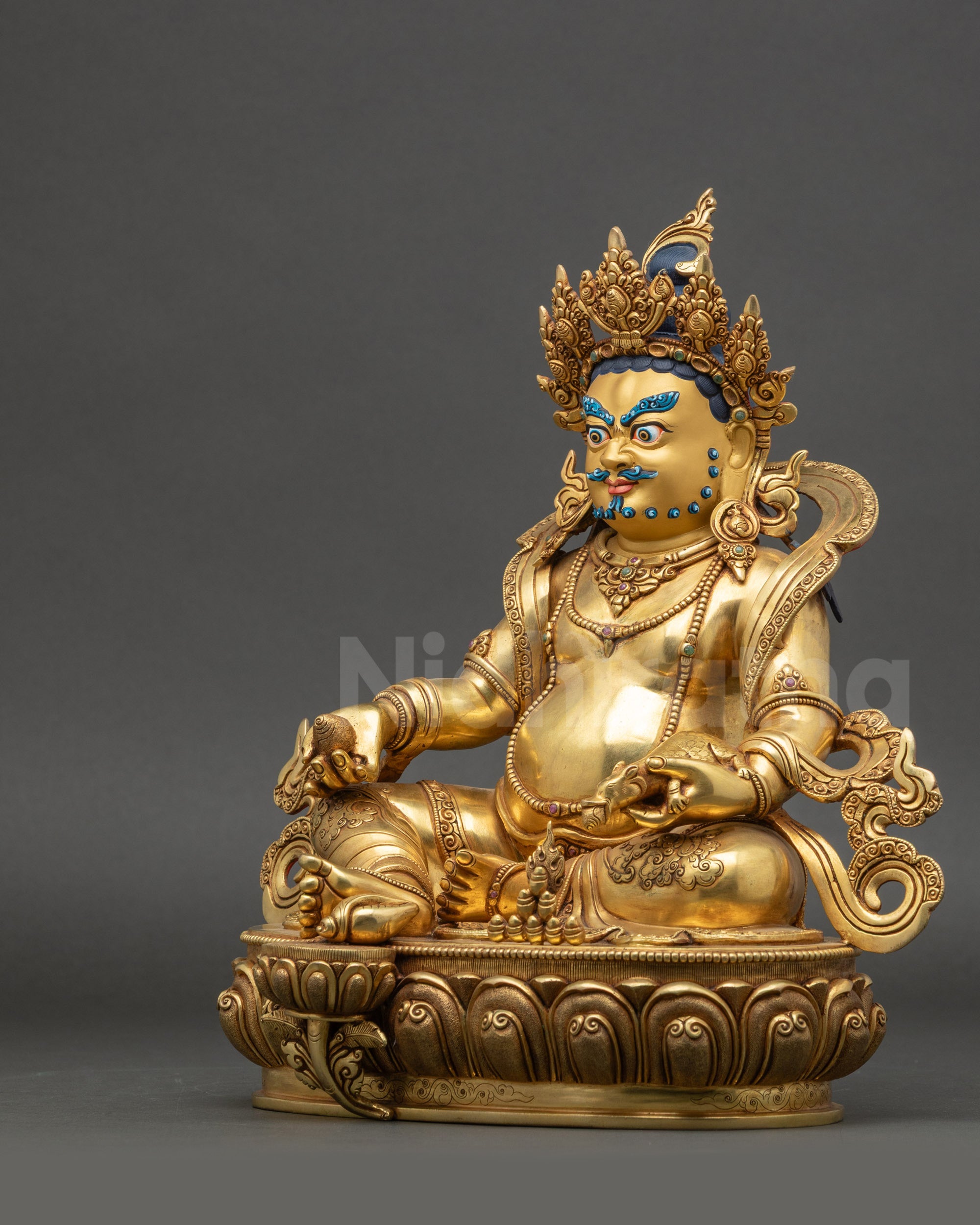 Left side view of Dzambhala gold-gilded copper Dzambhala deity