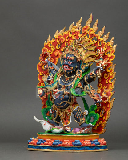 Left side view of Gonpo Chagdrugpa statue with gold-plated finish and dynamic posture