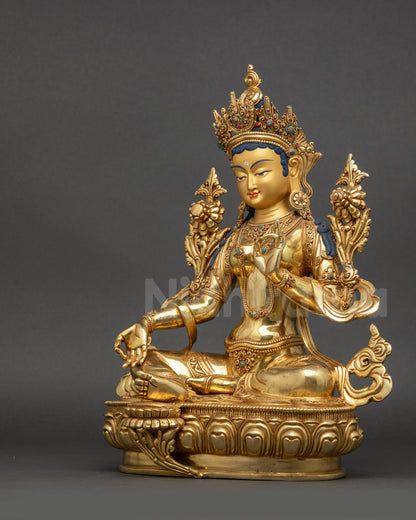 Left side view of Green Tara Statue displaying detailed crown and elegant posture