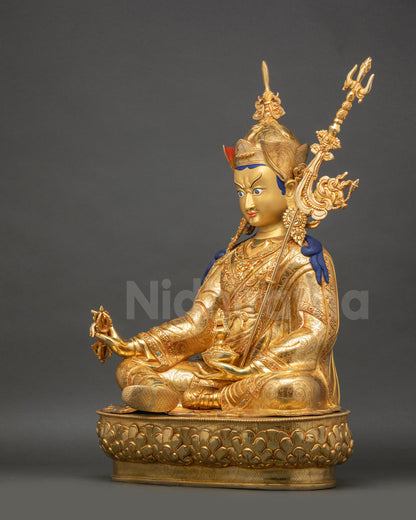 Left side view of Guru Rinpoche Statue highlighting sacred hand gestures and ornate carvings