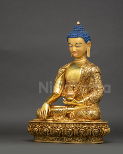 Left side view of Shakyamuni Buddha statue with carved robes