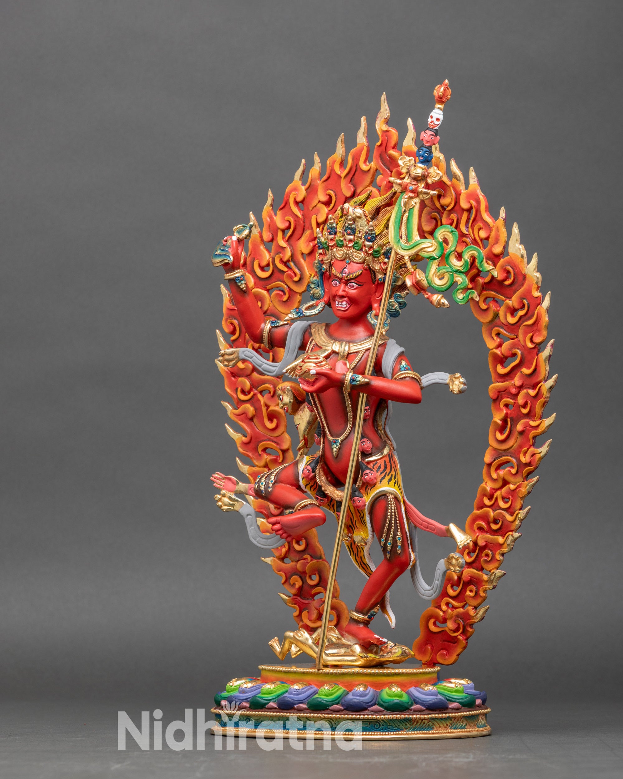 Left side view of Troma Nagmo statue, dynamic posture and ritual implements