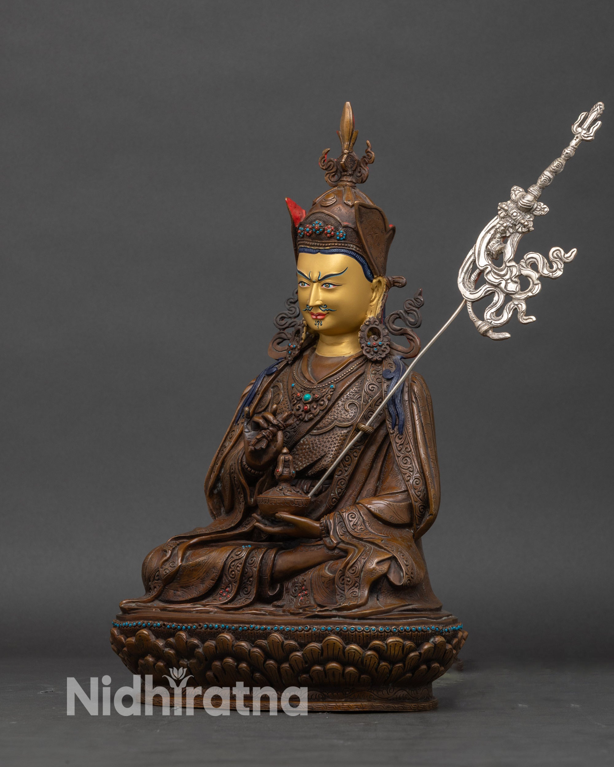 Left side view of Tsokye Dorje, a Himalayan Buddhist statue handcrafted in Nepal with ornate robe details.