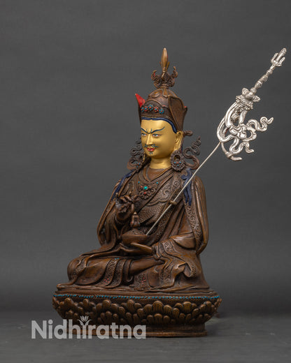 Left side view of Tsokye Dorje, a Himalayan Buddhist statue handcrafted in Nepal with ornate robe details.