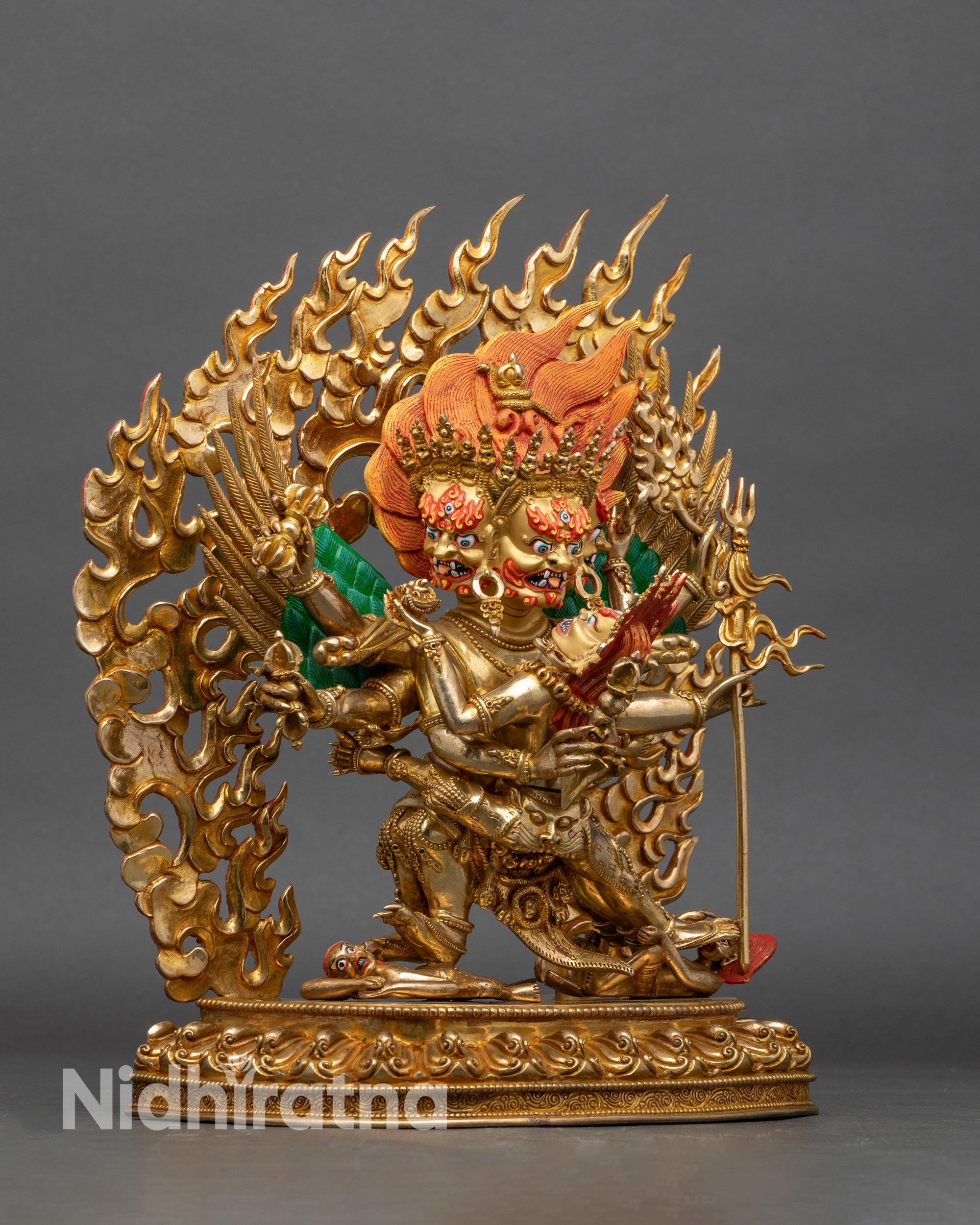 Left side view of Vajrakilaya statue, detailed wings, ritual objects, and Yab-Yum pose