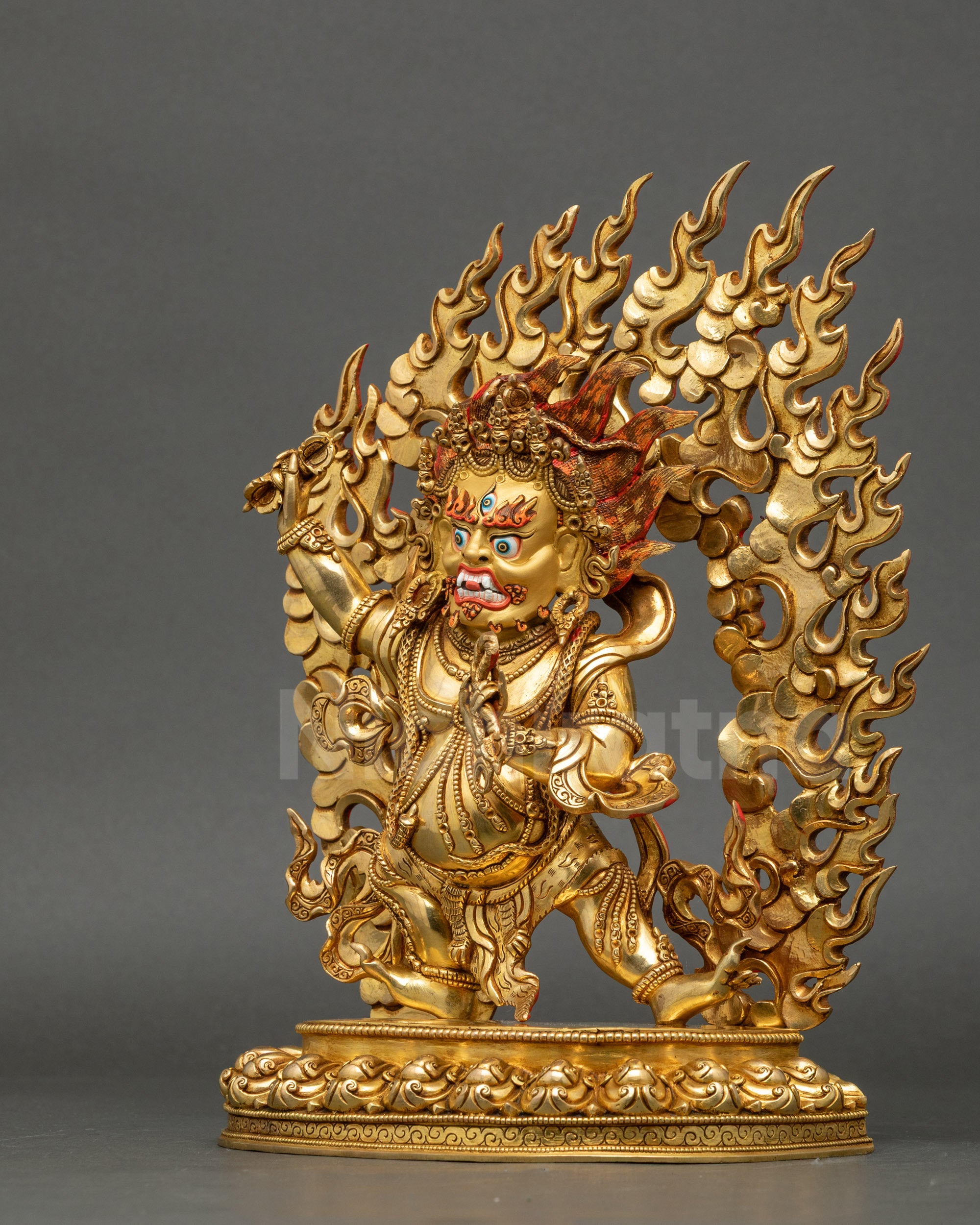 Left side view of Vajrapani Statue showing vajra, lasso, and intricate craftsmanship