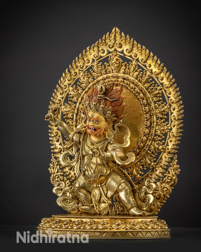 Left side view of Vajrapani statue displaying halo and ornaments
