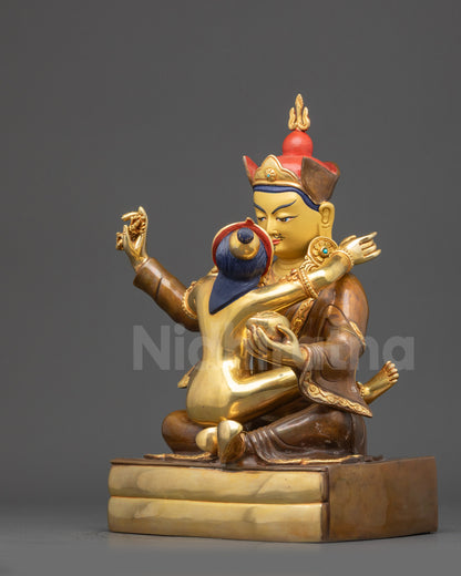 Left side view of half gold fire-gilded Guru Rinpoche and Consort Nepalese statue
