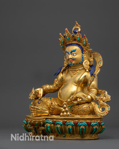 Left view Dzambhala holding citrion fruits and spitting mongoose representing wealth and abundance in Tibetan tradition
