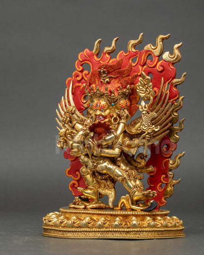 Left view of Vajrakilaya Statue with consort holding skull cup and kartika
