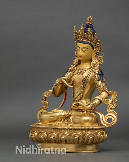 Left view of Vajrasattva statue displaying flowing robes and lotus pedestal craftsmanship