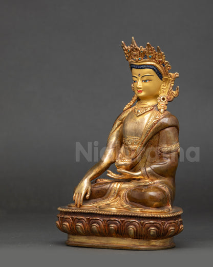 Left view side Buddha Shakyamuni Statue with crown, earrings, and seated posture
