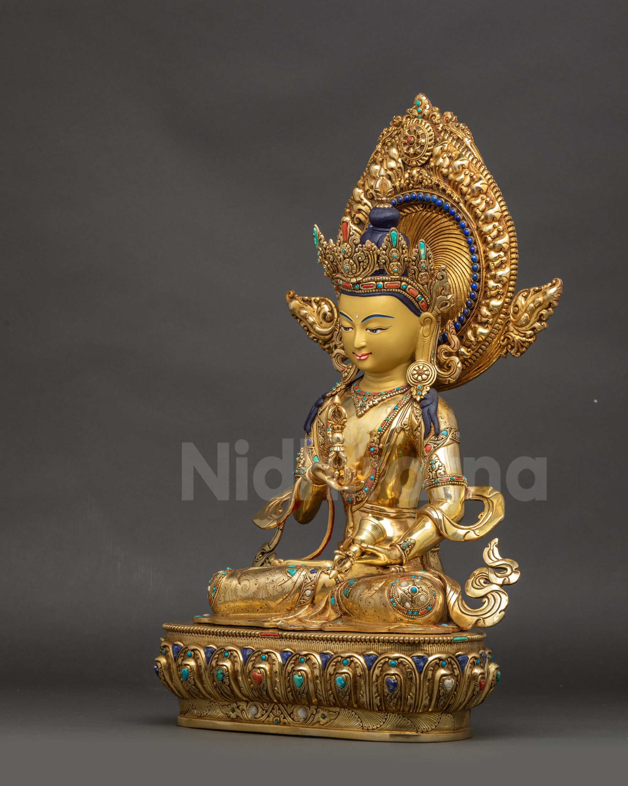 Left view side Dorje Sempa sculpture lotus pedestal, semi-precious stones and jewelry details