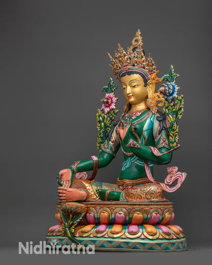 Left view side Green Tara statue left profile with Varada and Vitarka mudra
