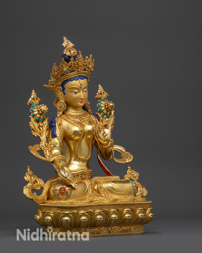 Left view side White Tara holding utpala stem in Varada and Vitarka mudra with detailed carving
