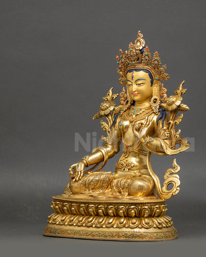 Left view side White Tara statue highlighting crown and floating robe craftsmanship