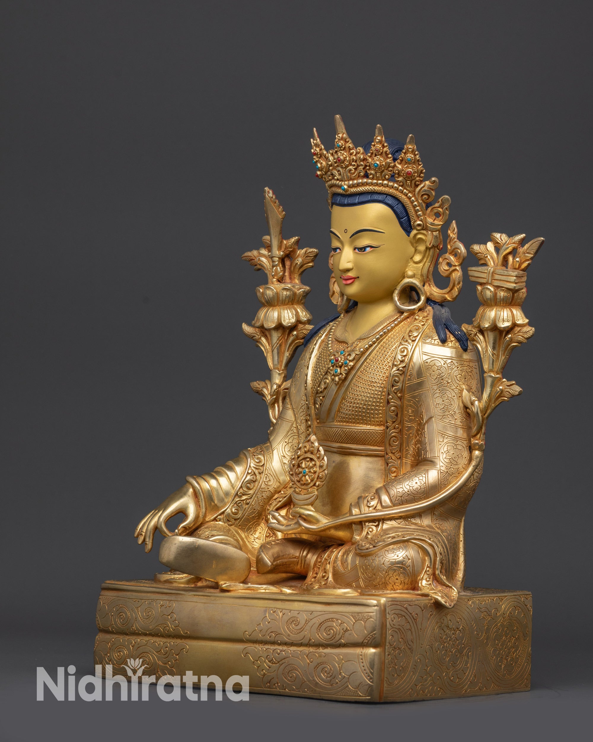 Left view side handcrafted Trisong Detsen statue showing Varada Mudra and jewelry
