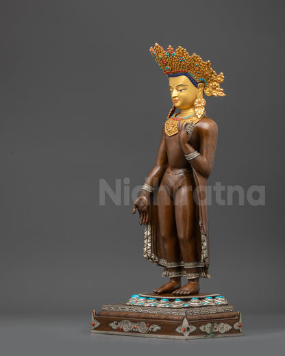 Left view side of Dipankara Buddha statue with oxidized copper and silver-plated robes
