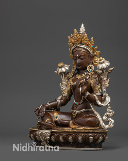 Left view side of Green Tara Sculpture with flowing robe and gold-plated finish
