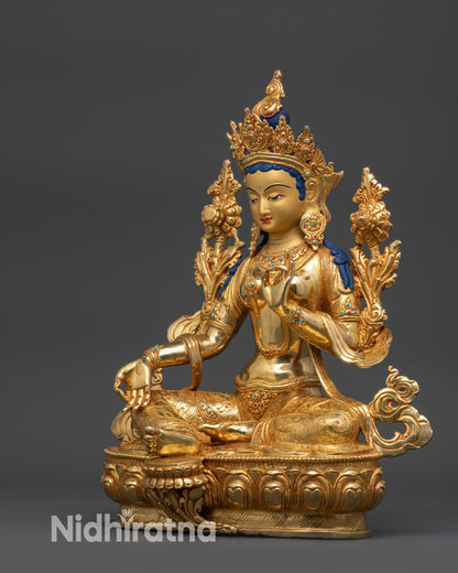 Left view side of Green Tara with semi-precious stones and gold-gilded details