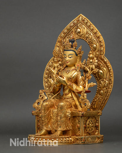Left view side of Maitreya Buddha statue showing utpala stem and ornate garments