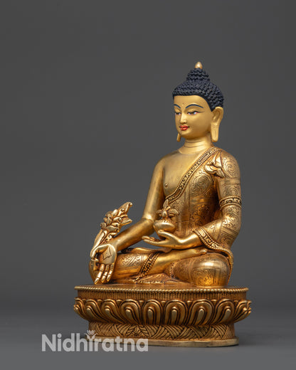 Left view side of Medicine Buddha statue highlighting myrobalan stem and detailed patterns
